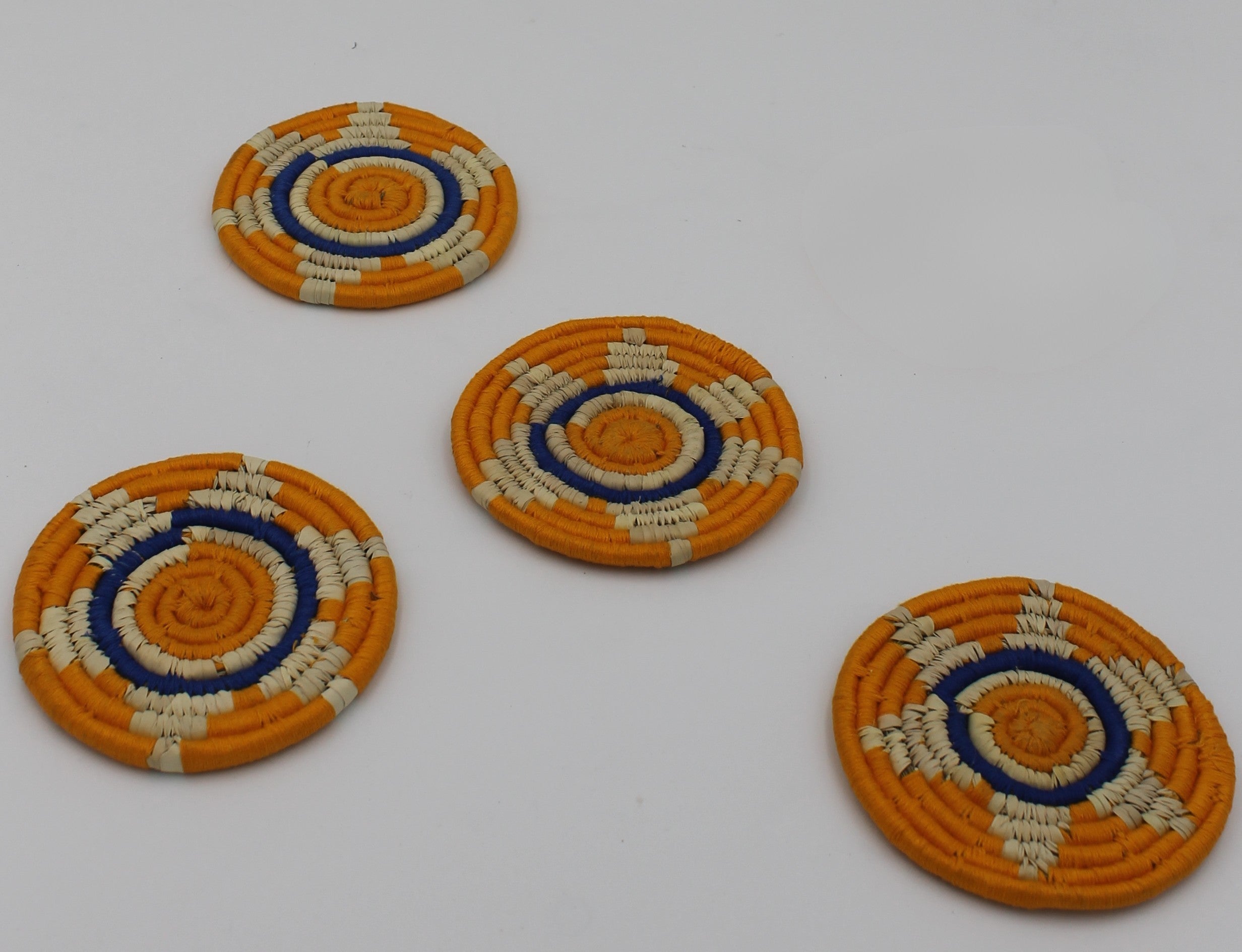Sabai Grass Coasters – Handwoven Round vibrant orange Coaster Set of 4 | Eco-Friendly, Natural, Traditional Tableware